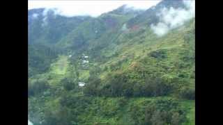 MAF Caravan Landing On a Mountain Airstrip  Papua Indonesia [upl. by Merrielle]