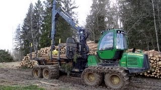 John Deere 1010E moving timber [upl. by Eetnod]