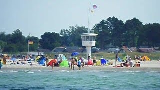 Der Priwall Strand im Sommer vom Fluss Trave aus gesehen [upl. by Lyrradal370]