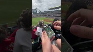 Opening a pack of Topps Series 1 Baseball in front of a baseball game [upl. by Raffarty]