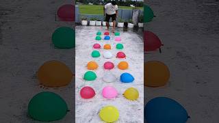 The balloon man jumps onto water balloons randomlyfunny race trending balloon challenge sports [upl. by Teleya798]