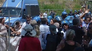 Italy angry locals refuse to accept migrants in their communities [upl. by Roter588]