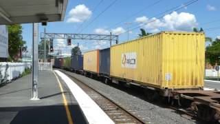 Aurizon diesel locomotive 2829 hauls a container freight train through Strathpine Station [upl. by Maisey]