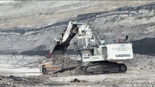 Big Excavator liebherr 9350 Loading Caterpillar Dumper [upl. by Eziechiele]