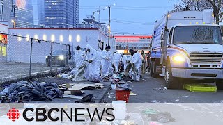 Tents torn down as workers police remove Edmonton encampment [upl. by Aicela208]