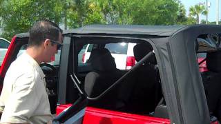 2011 Jeep Wrangler soft top removal at Atlantic Dodge in St Augustine Florida [upl. by Ellimak]