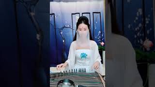 Traditional Chinese girl playing guzheng aka Chinese zither [upl. by Gwendolin]