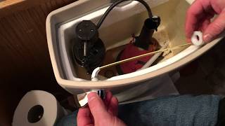 How To Replace A Toilet Flush Lever Handle [upl. by Esinej]