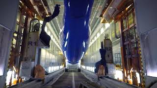 Belavias first Embraer E195E2 in the paint shop [upl. by Akimrehs]