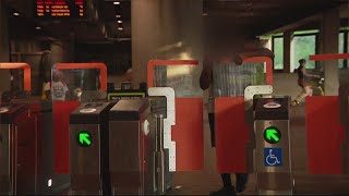 Metro fare evaders push through gates designed to prevent people from jumping over [upl. by Annoel240]