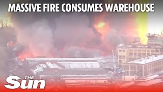 Massive fire engulfs New Jersey warehouse [upl. by Hayton]