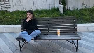 girl smoking cigarette on bench near the beach [upl. by Nuawtna]