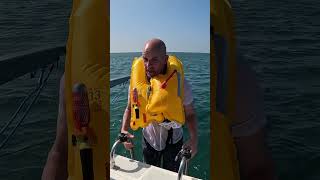 How do life jackets work when you fall overboard lifesavers lifehack boatlife [upl. by Akinirt]