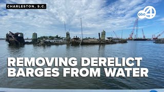 Cleanup effort targets derelict barges in Clouter Creek in Charleston [upl. by Fi917]