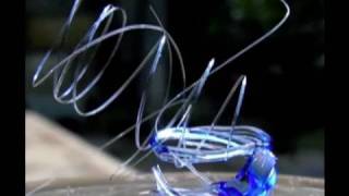 Melting Glass with the sun n Fresnel Lens to make glass springs with sun power [upl. by Atela]