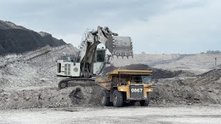 Mining work Liebherr 9350 Big Excavator Loading Komatsu Hd 7857 [upl. by Uno]