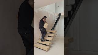 Central spine staircasewoodworking home construction [upl. by Asenaj]