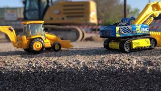 Construction toys  Hot wheels Matchbox and NORSCOT CAT 966G Wheel Loader at construction site￼ [upl. by Branch523]