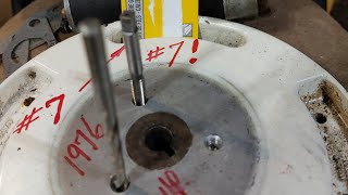 Tap a Chrysler outboard flywheel for a 3bolt puller USE A NUMBER 7 DRILL BIT outboard diy [upl. by Akiehs]