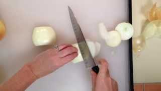 How to Vertically Slice Onions  Cooking Light [upl. by Arama]