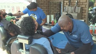 Man brings mobile barbershop to Juneteenth event to support KCPS Foundation [upl. by Tyra]