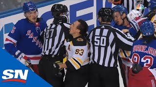 Brad Marchand Receives Helmet Popping Cross Check From Pavel Buchnevich [upl. by Atsiuqal117]