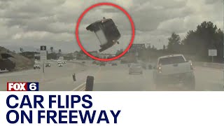 Car goes airborne flips on Los Angeles freeway after hitting tire  FOX6 News Milwaukee [upl. by Salchunas]