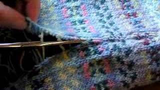 Cutting a steek in a Knitted Fair Isle baby blanket [upl. by Towroy]