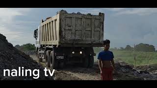 10 wheeler dump truck unloading 25 cubuc miter boulders Philippines [upl. by Bittencourt]