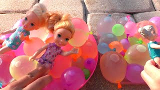 Water balloons Elsa amp Anna toddlers  pool  water fun  floaties [upl. by Aiset]