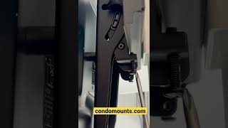 How to Remove safety screw to unlock tv from stuck position Condomounts tvmount wallmount [upl. by Nossyla]