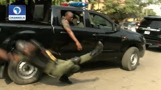 Video Jubilating Policeman Falls Off Moving Van In Lagos [upl. by Ynattyrb]