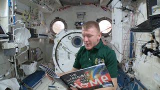 A oneoff picture book is read to a child from space [upl. by Eam]