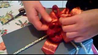 Come fare un fiocco regalo How to make a bow mp4 [upl. by Ailido811]