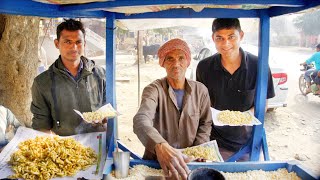 Street 10 Rupees Bhel Puri Eating Challenge  70 Year Old Man Selling Bhel Puri  Baba Ji Bhel [upl. by Suhpesoj]