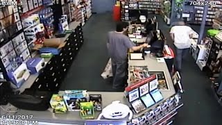 Surveillance video captures armed robbery at Hialeah GameStop [upl. by Ahsillek]