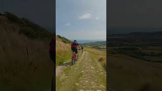 Descending off Nine Barrow Down on the Purbeck Dorset with Swanage in the distance mtb adventure [upl. by Tarrel432]