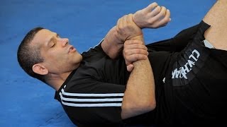 How to Do a Traditional Kimura from Guard  MMA Submissions [upl. by Pickar]